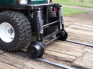 hyrailer vehicle parked on tracks