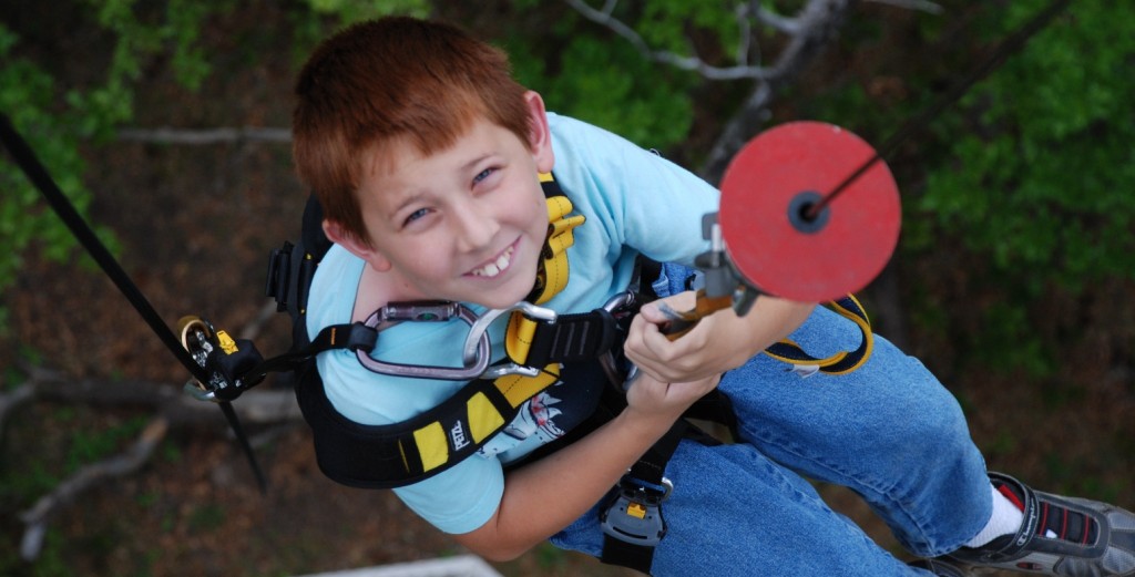 DSC_0454-e1371151928479-1024×521 a young boy holding a baseball bat