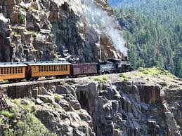 a train on a rocky hill